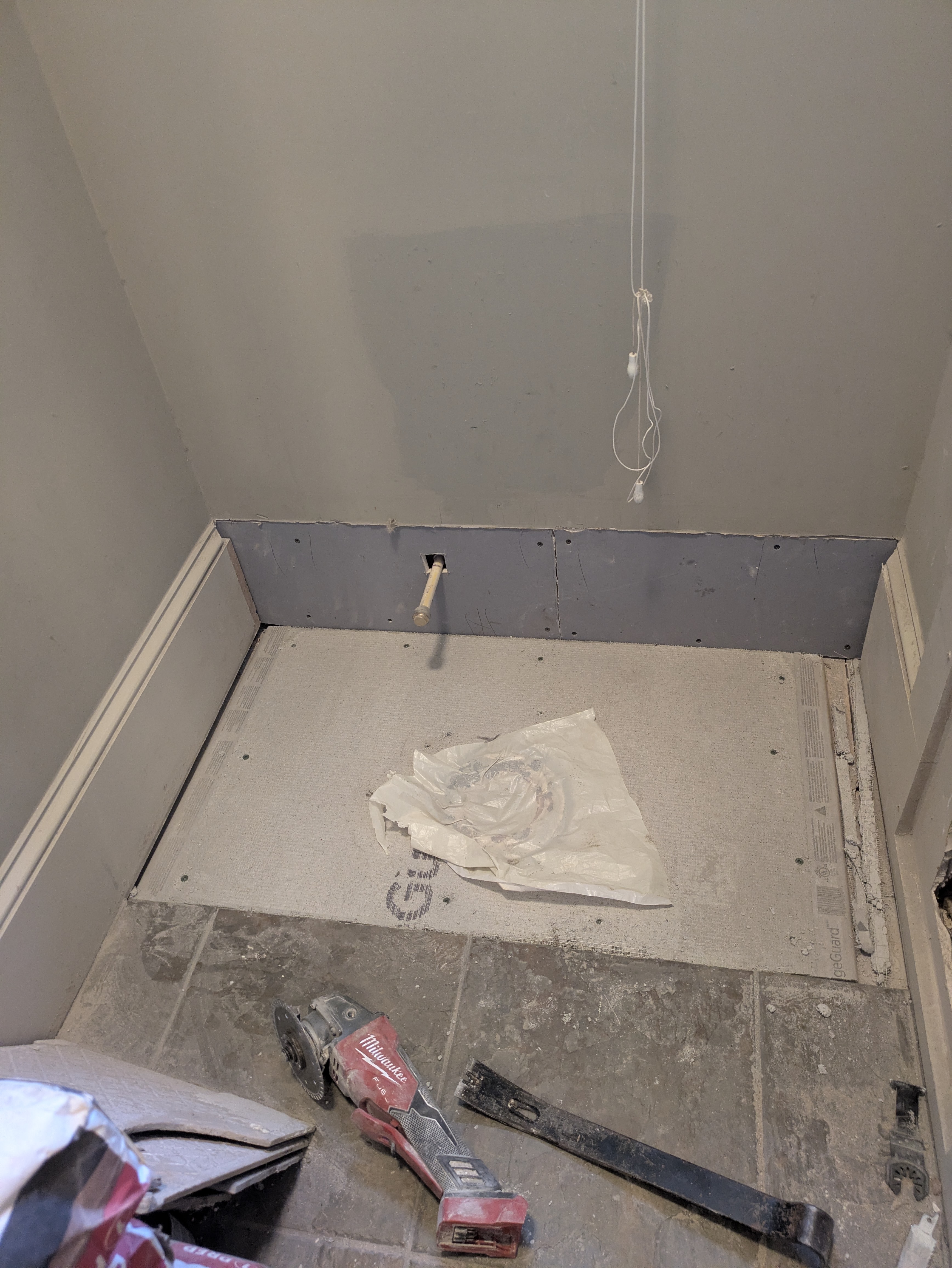 Preparing the shower base for waterproofing and tile in Athens